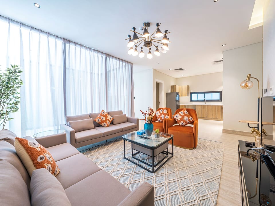 Apartment, 3 Bedrooms | Living area | 55-inch LCD TV with digital channels, TV