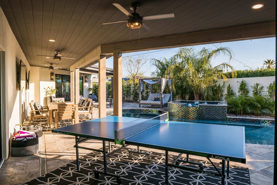 Enjoy some games by the pool area. 