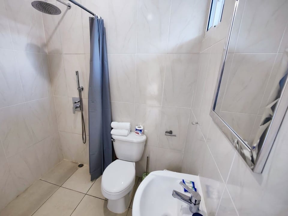 Shower, towels, soap, shampoo