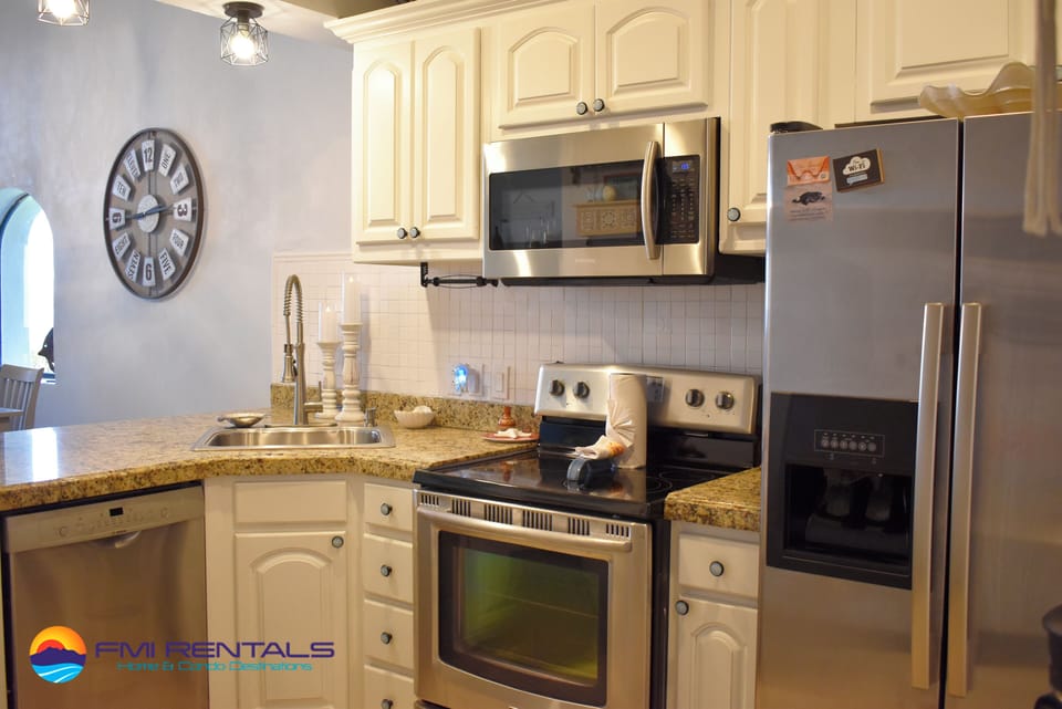 stainless steel appliances and granite countertops