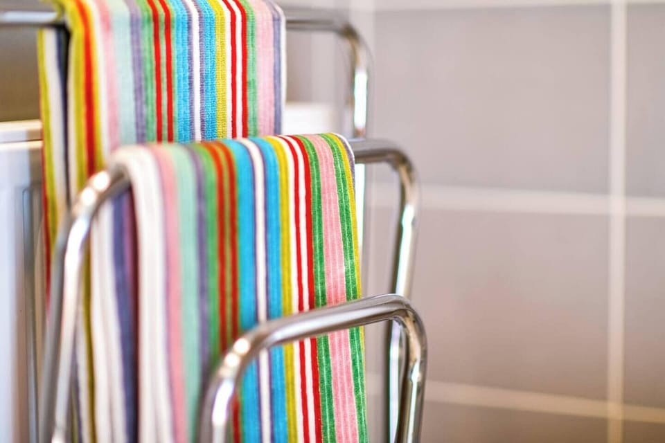 Luxury Room, 1 Double Bed | Bathroom | Shower, hair dryer, heated floors, towels