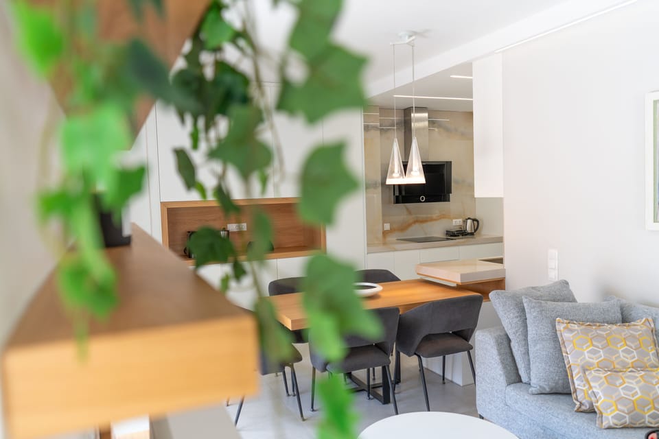 Luxury Apartment | Living area | 50-inch Smart TV with cable channels, TV