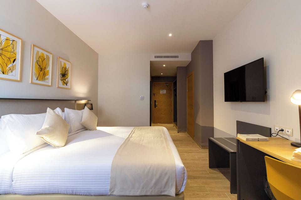 Select Comfort beds, minibar, in-room safe, desk
