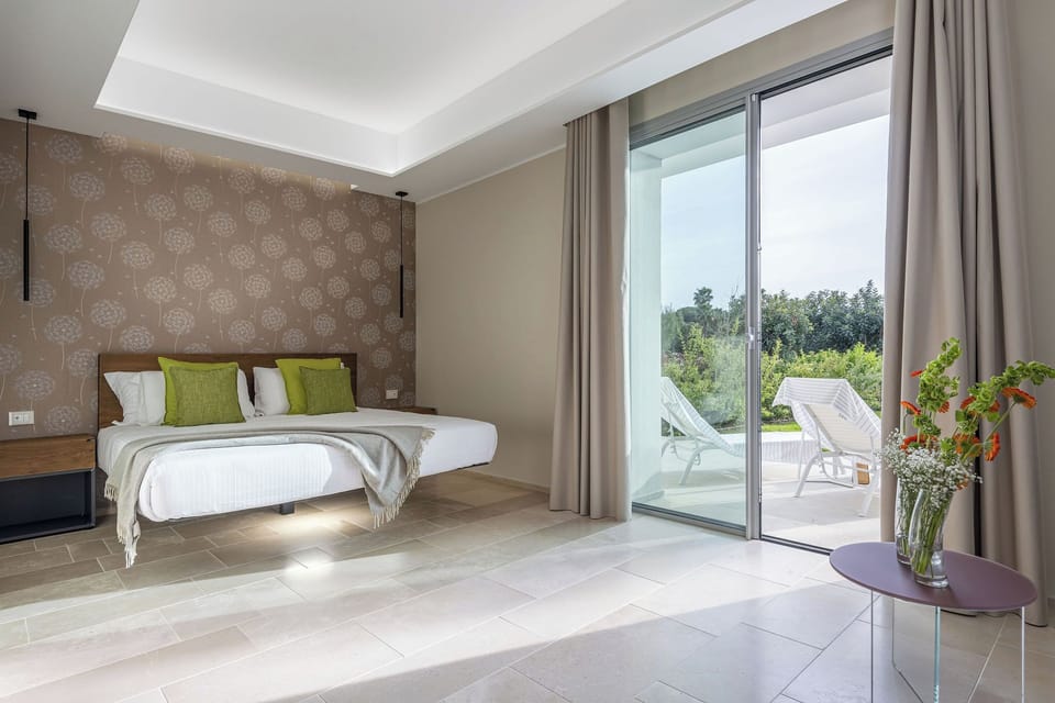 Junior Suite with Private Garden or Terrace | In-room safe, desk, soundproofing, free WiFi
