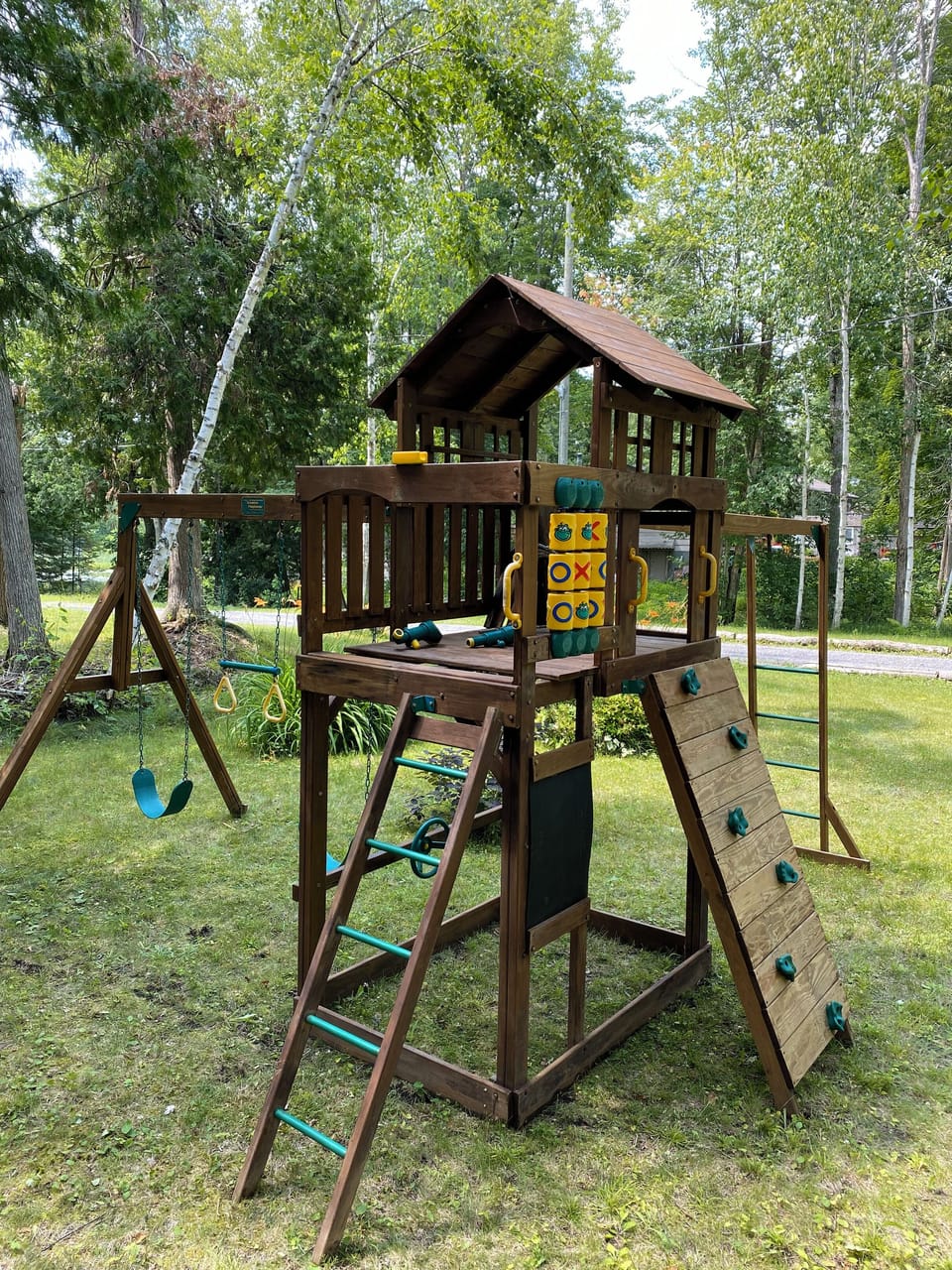 Full play set with swings, rock climbing, etc. for children!