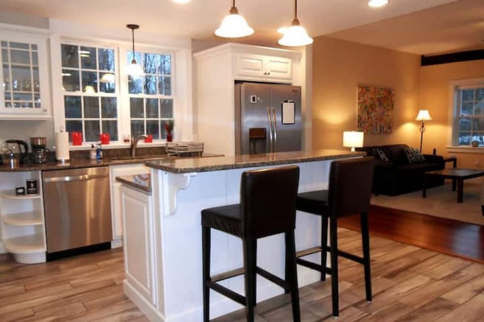Kitchens opens to living room