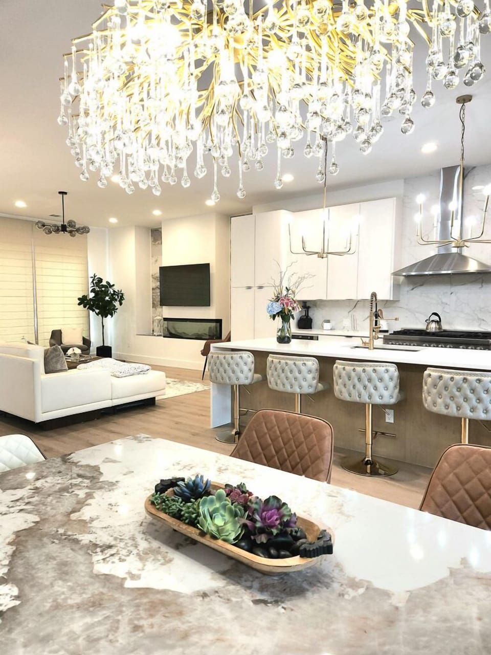 Open concept kitchen area with plenty of seating for the whole group to enjoy the space