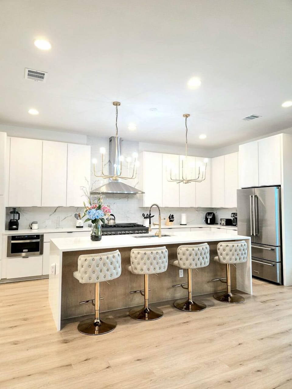 Kitchen with island seating to sit and sip some delicious coffee before starting the day