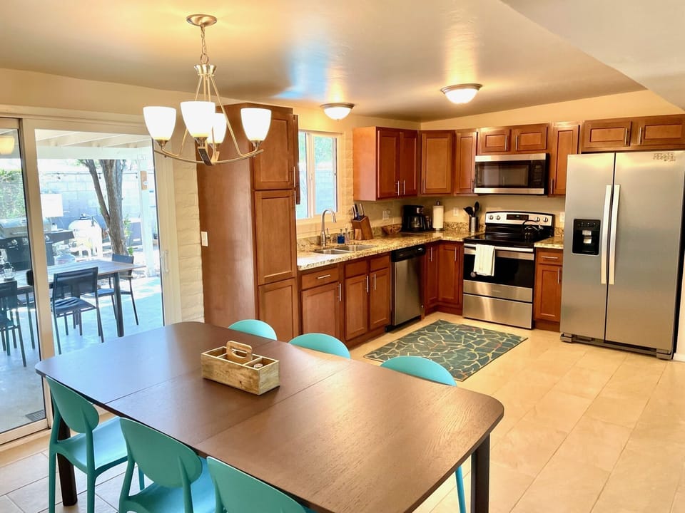 Stainless appliances and granite countertops in kitchen