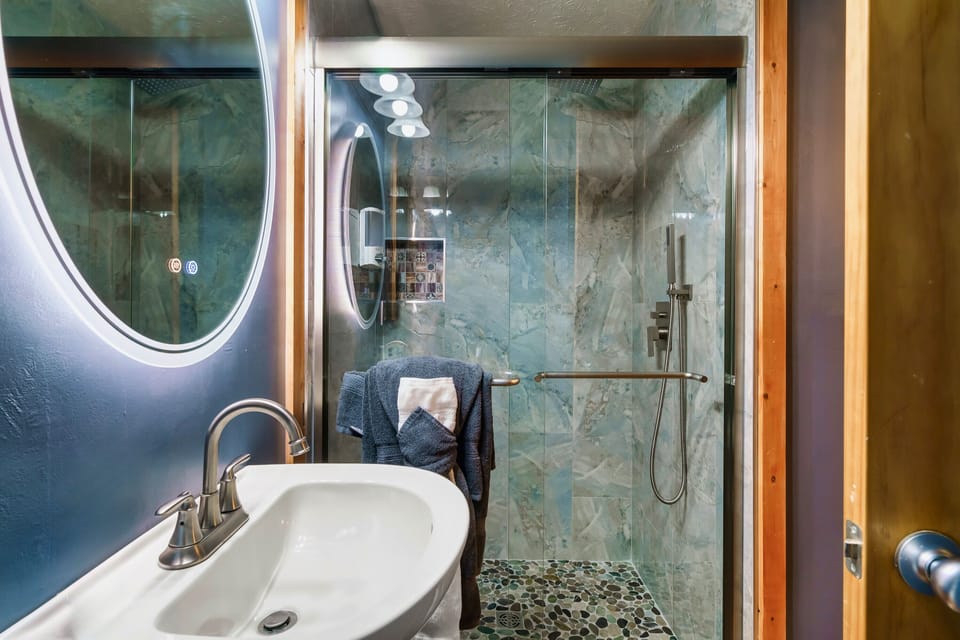 Exquisite shower, sink, and vanity: Radiant and refreshed!
