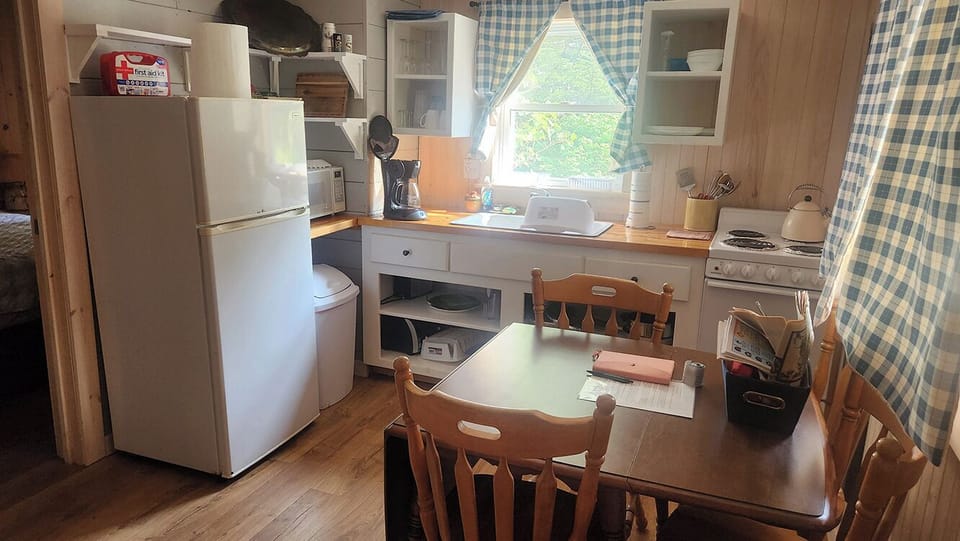 Full kitchen with drop leaf table has all the comforts of home