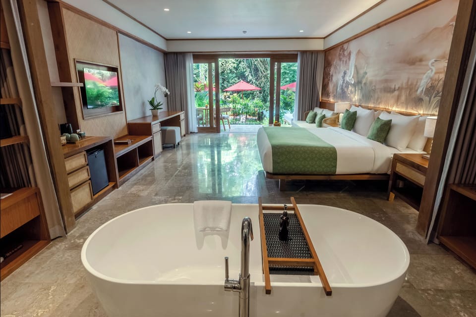Premier Suite with free benefit | Bathroom | Separate tub and shower, deep soaking tub, rainfall showerhead