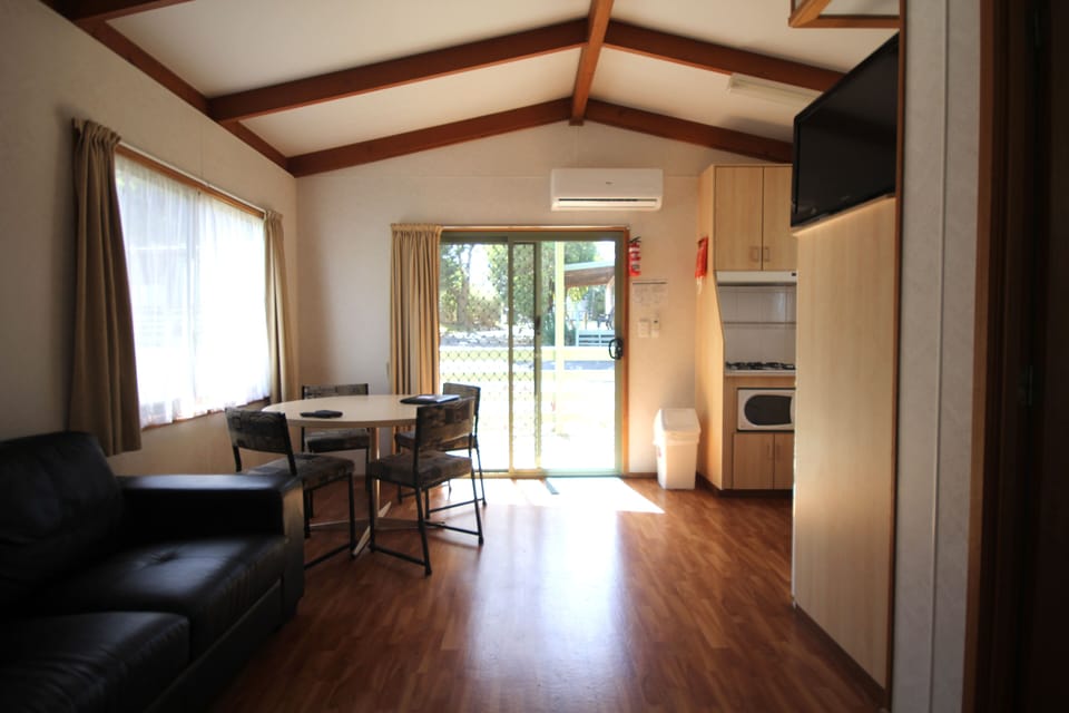 Traditional Cabin, 2 Bedrooms | Living area | LCD TV