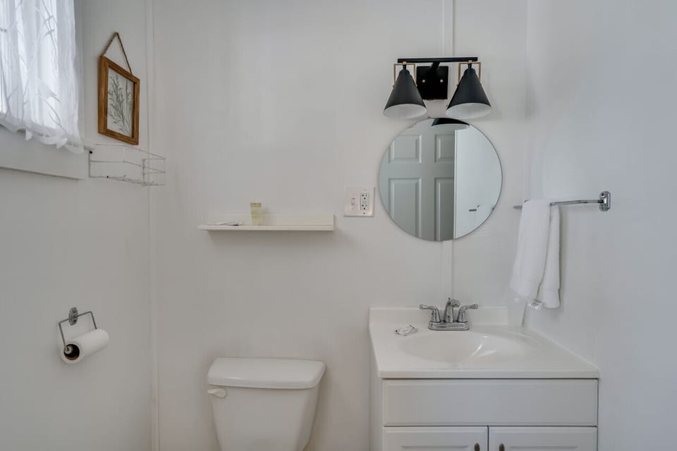 Bathroom with hair dryer provided