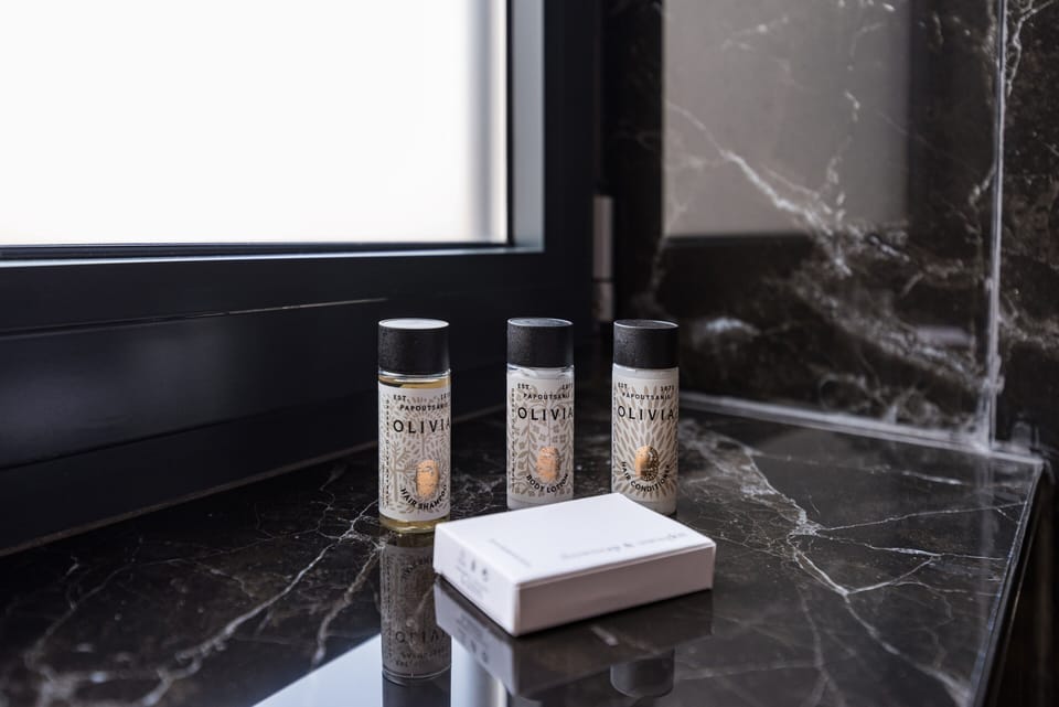 Superior Suite | Bathroom | Shower, hair dryer, bathrobes, slippers