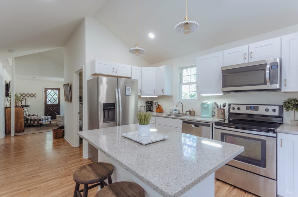 Cottage kitchen with stainless steel appliances