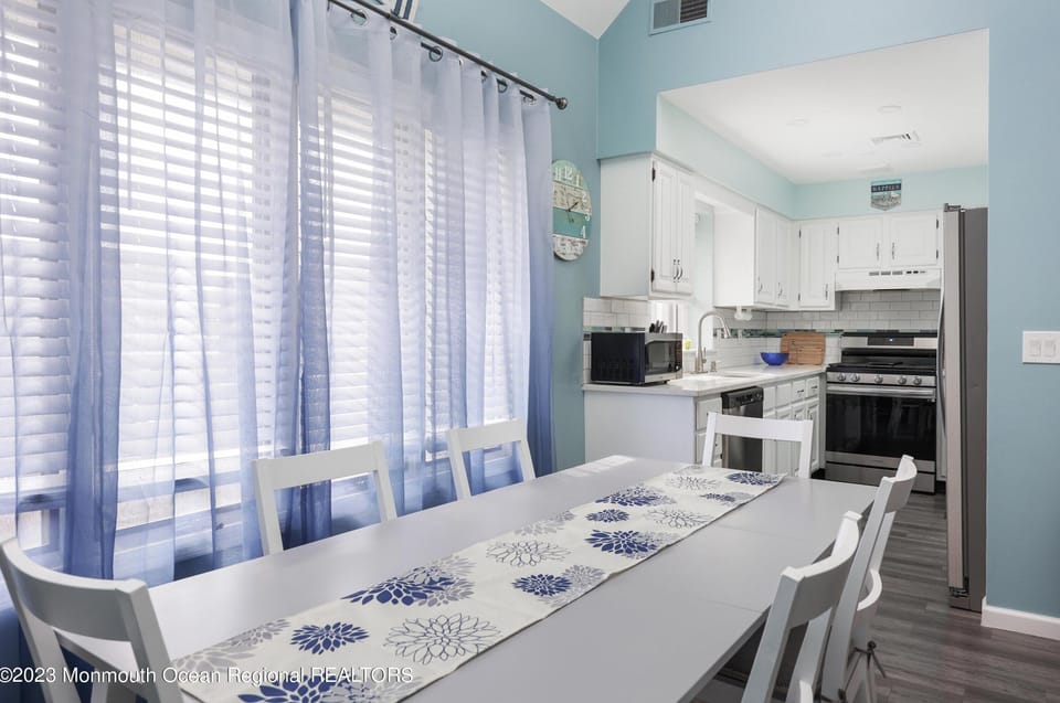 Dining Table with views of kitchen.
