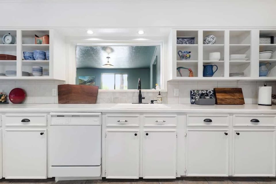 Full kitchen with amenities including dishwasher