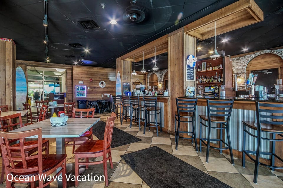 Cozy rustic bar with wood accents, stylish seating, and warm, inviting lighting