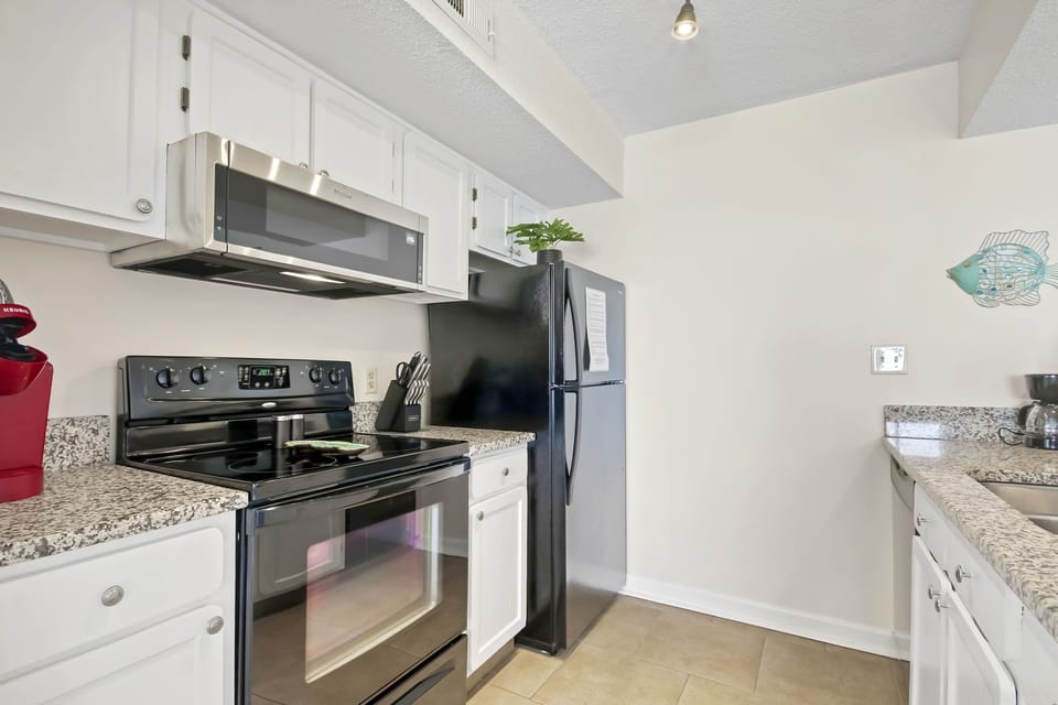Electric oven and Ceramic cooktop for full meal prep and easy cleanup.