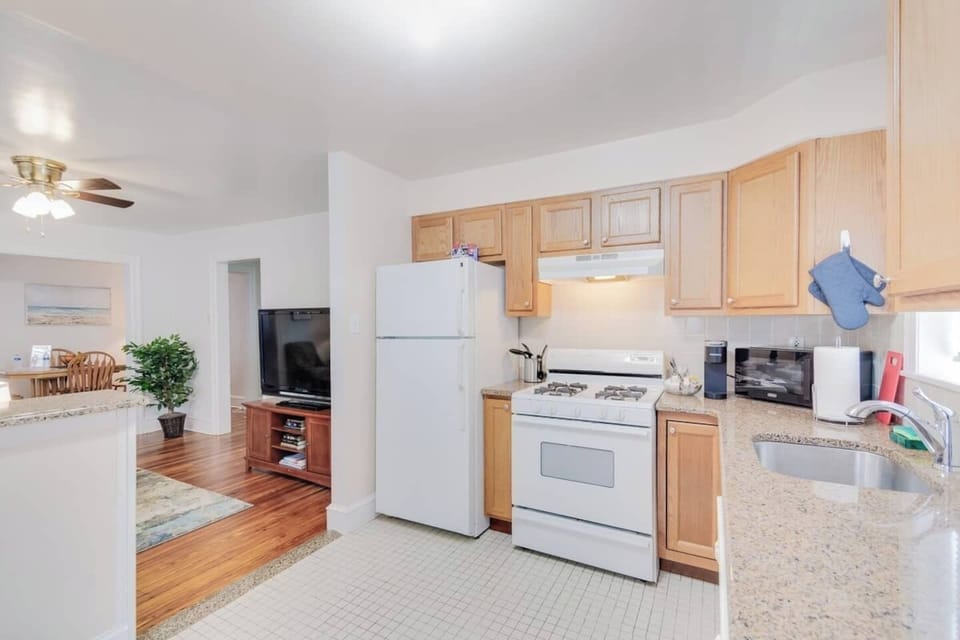 From inside the kitchen our guests have full access to the open Living and Dining areas.