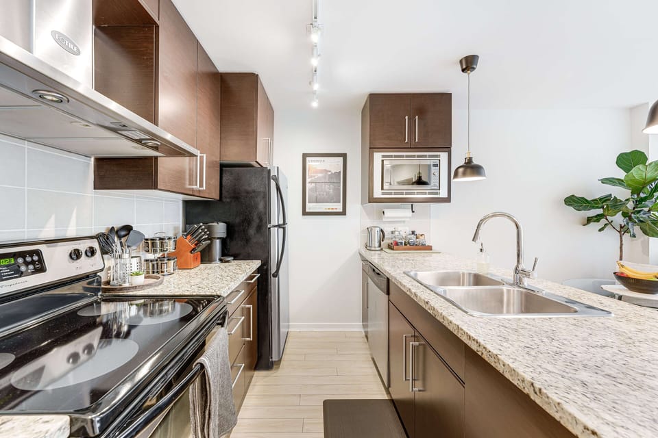Fully outfitted kitchen, complete with all the essential appliances.