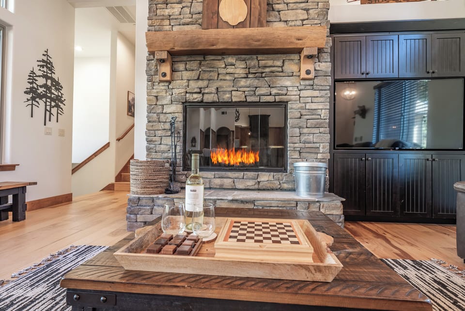 Cozy up to the wood burning fireplace and enjoy a bottle of wine upon arrival! Wood provided in the winter time.