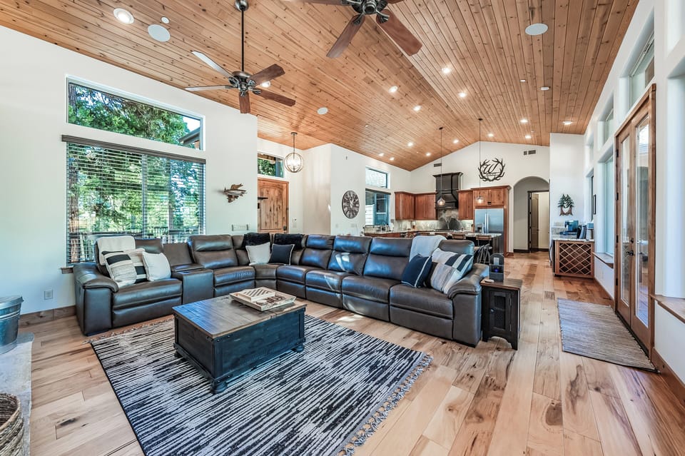 Huge picture windows bring the forest inside.