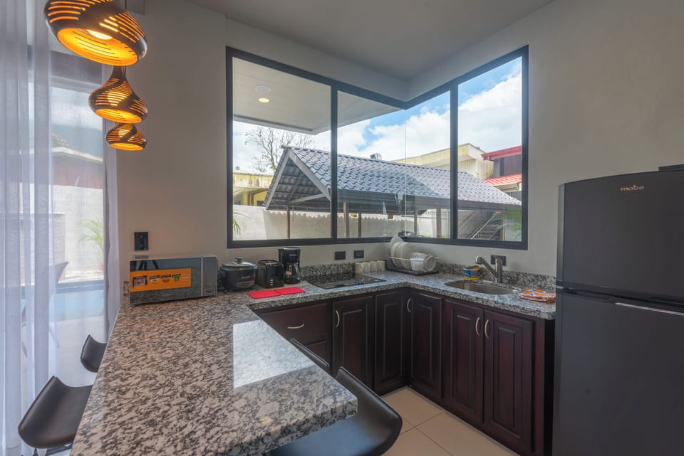 Deluxe Villa, Balcony, Mountain View | Private kitchen | Mini-fridge, microwave, coffee/tea maker, toaster