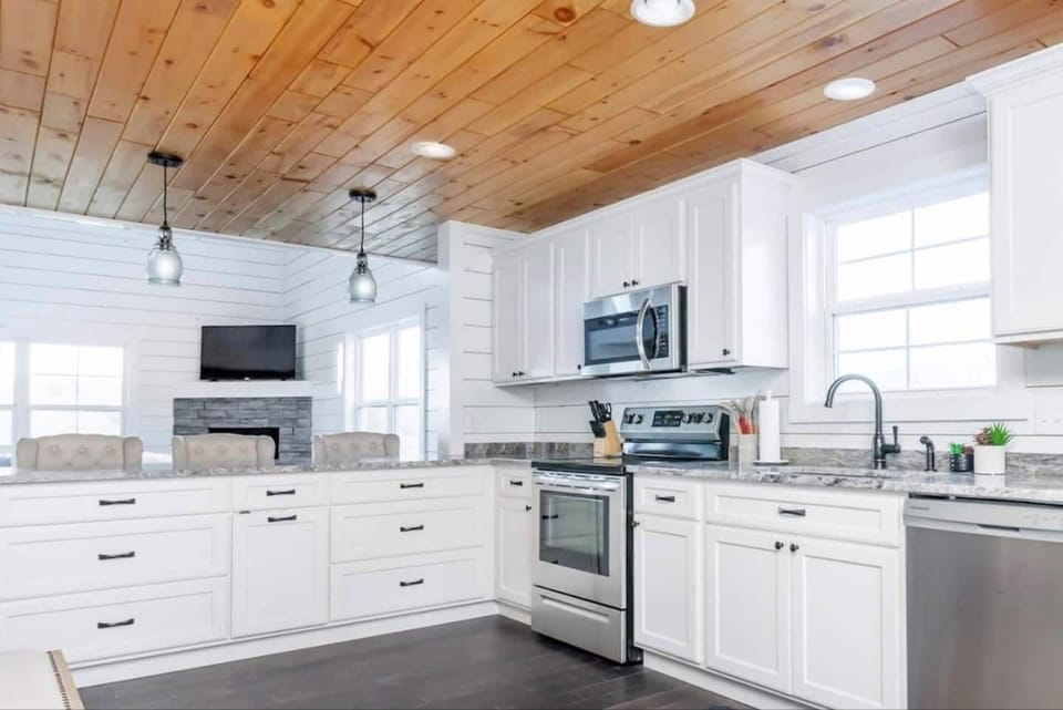 kitchen with new appliances and counter tops