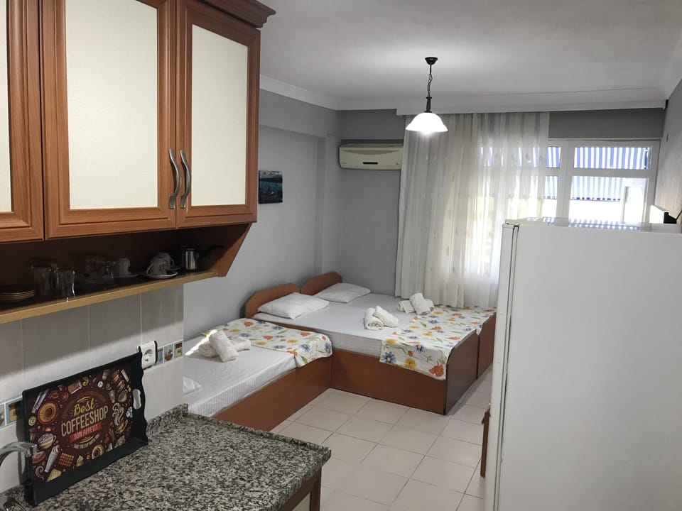 Quadruple Room | Premium bedding, desk, WiFi (free), bed sheets