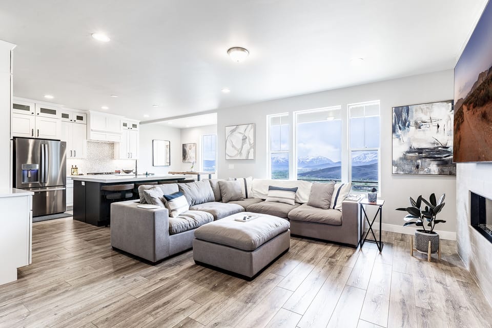 Relax on the oversized stuffed sectional as you take in one of the most amazing views in the Wasatch Back and 70" Smart TV above the "Wall of Fire"