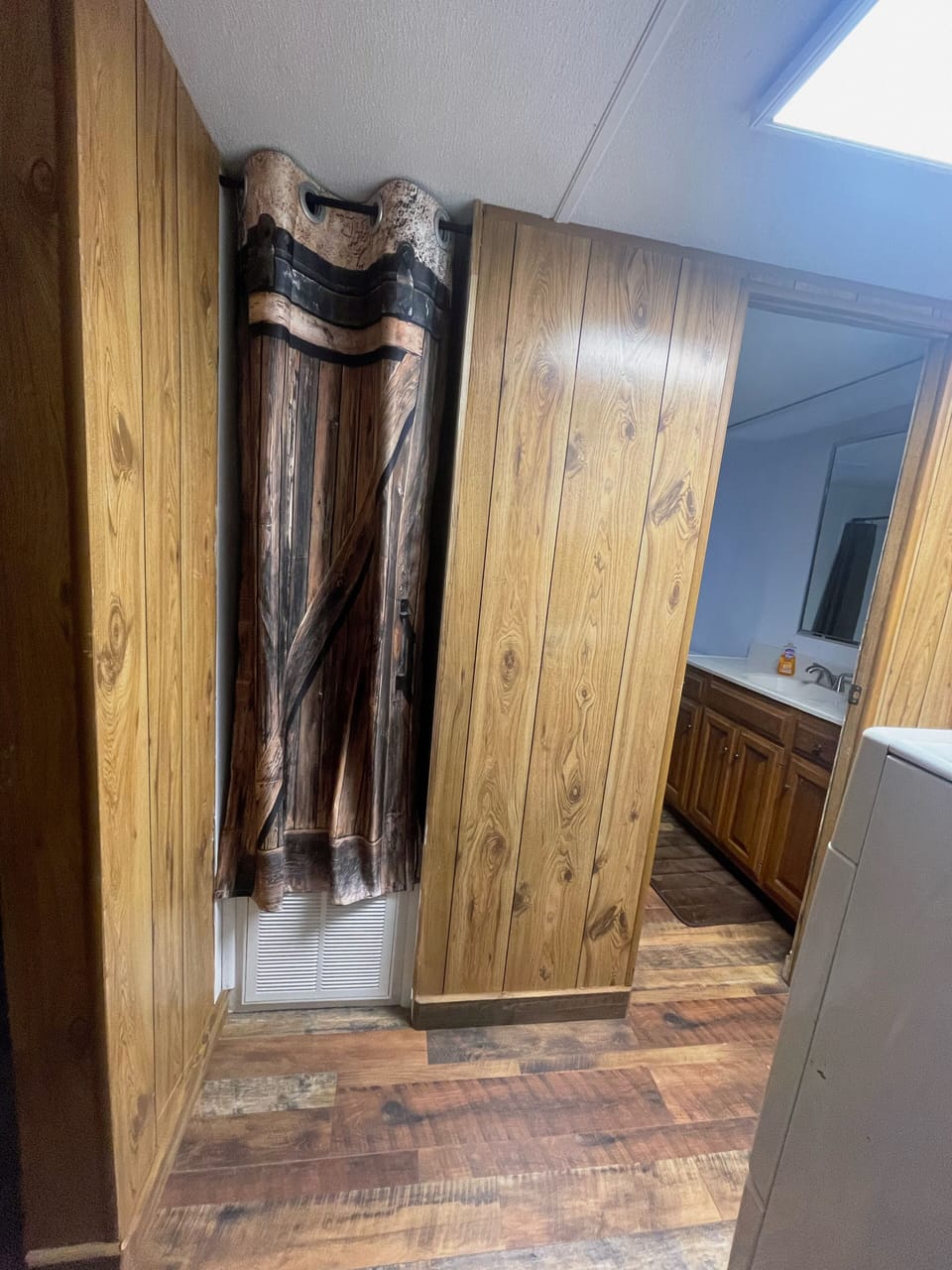 Hall Closet (highchair, ironing board) then Bathroom Entry