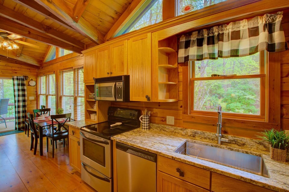 Kitchen Leads out to Creekside Another Al Fresco Dining Table for 4