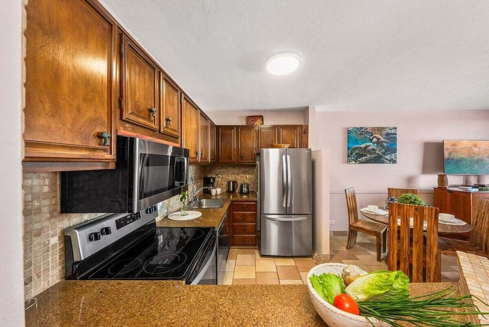 Spacious design with a view of the dining area for easy entertaining
