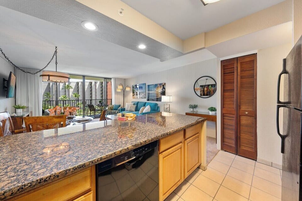 Spacious granite countertop perfect for preparing meal