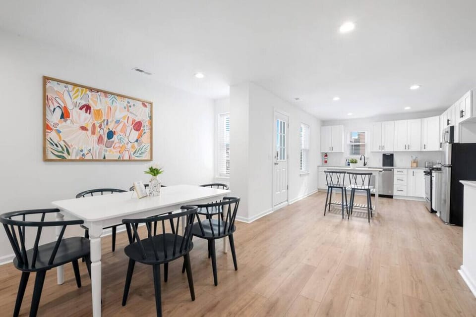 Gather, connect, and play! The versatile dining table with seating for 6 sets the stage for laptop productivity, shared meals, and lively board game adventures.