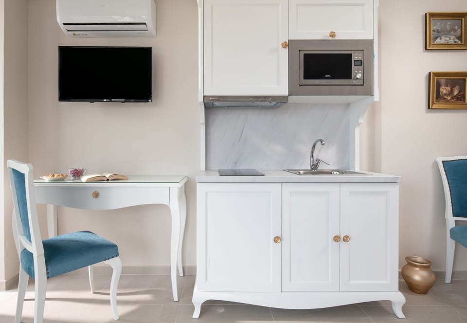 Mini-fridge, microwave, stovetop, electric kettle