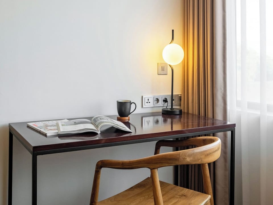 Desk, laptop workspace, free WiFi, bed sheets