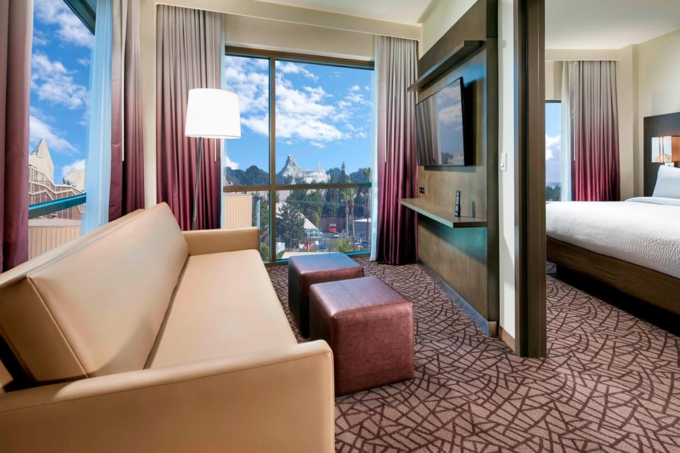 Suite, 1 Bedroom (View) | In-room safe, blackout drapes, iron/ironing board