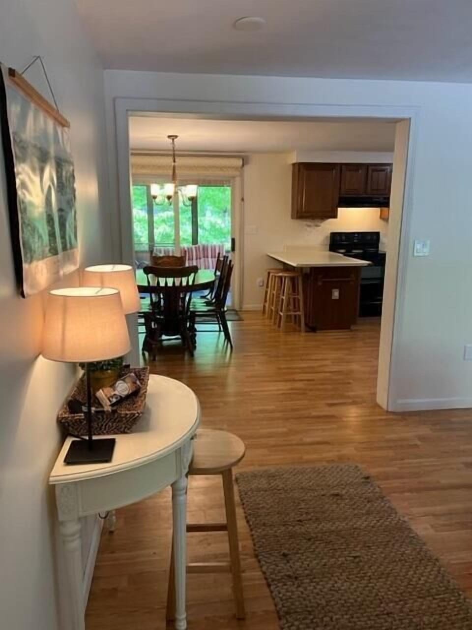 living room looking into open kitchen/ eating area