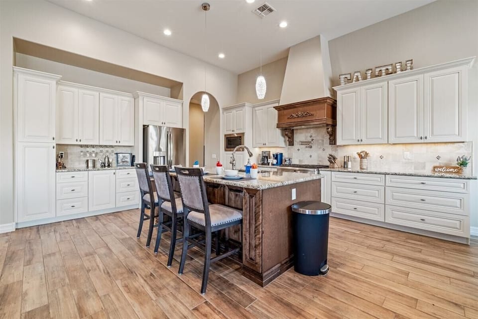 The kitchen has a gorgeous island and plenty of storage.