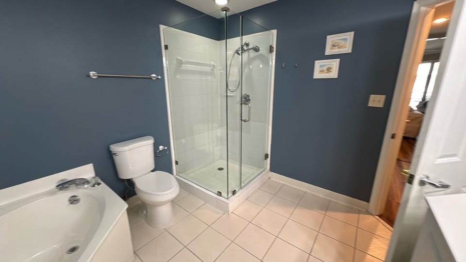 Primary Bathroom with Separate Tub and Shower at 1301 Sea Crest