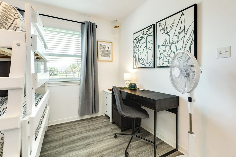 Desk area and tv makes a great space for the kids or teens in your group