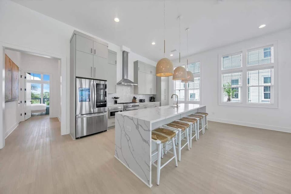 Large open kitchen and primary bedroom located on the first floor