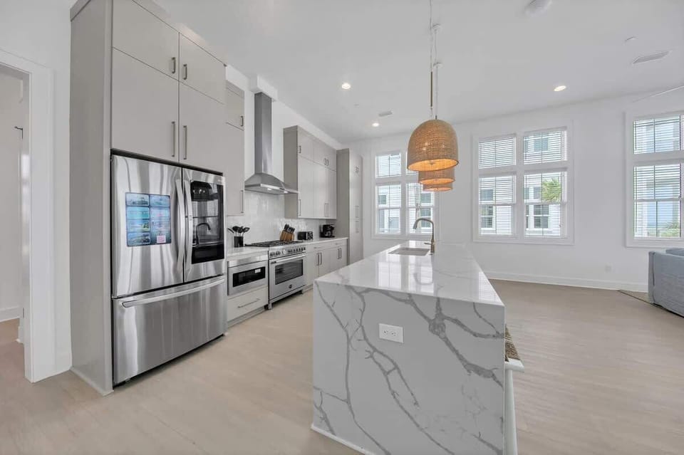 Fully stocked kitchen with 6 top gas range and two dishwashers