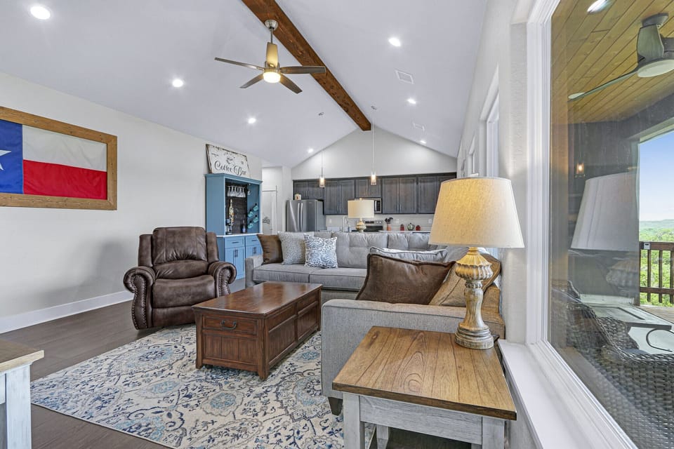 View of the living room looking toward the kitchen as you leave Bedroom 1.