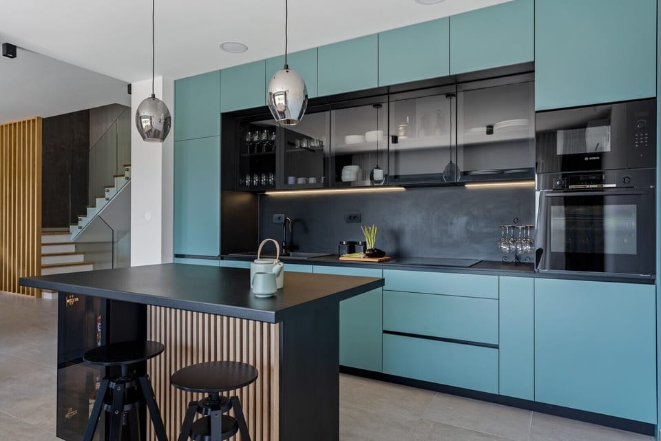 a fully equipped kitchen with all the amenities you need,   a kitchen island and a dining table 