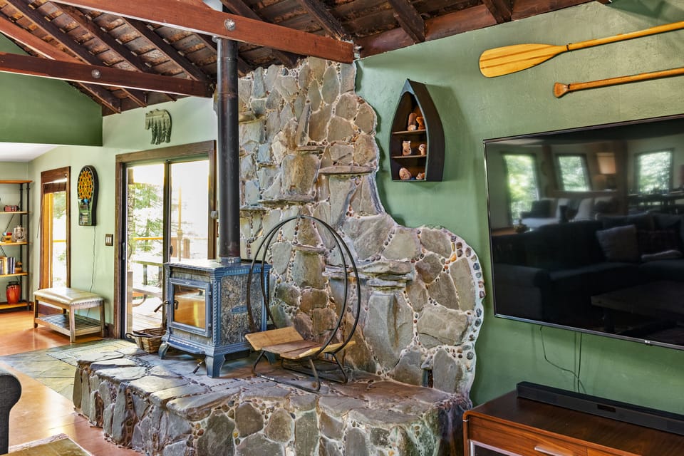 Wood burning stove and hand-laid stonework.