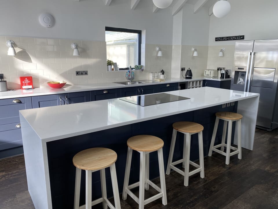 Enjoy a glass of wine and chat to the chef while they prepare dinner! 